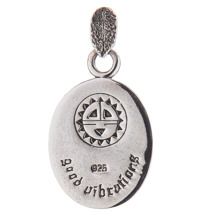 Back view of the pendant displaying the Native American Sun Symbol engraving.