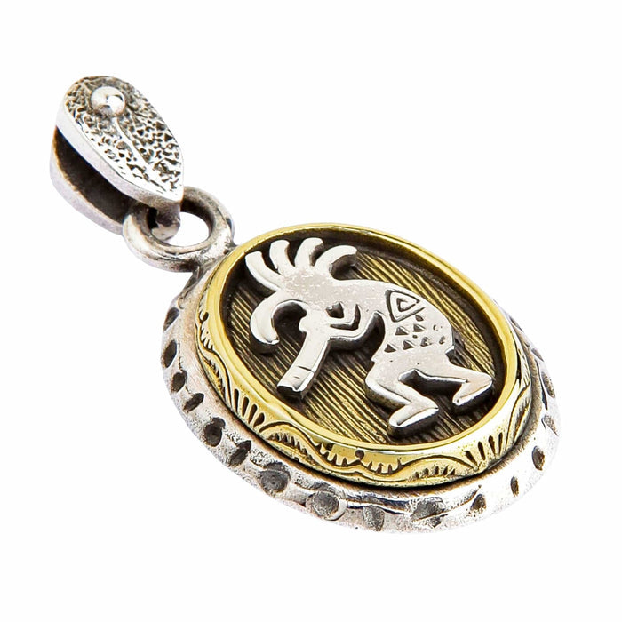 Side view of the Native American style Kokopelli pendant, showing the flute player and brass inlay.