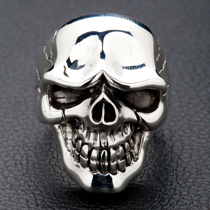 A front view of the heavy sterling silver handsome skull ring, showing its polished finish and stylized design.
