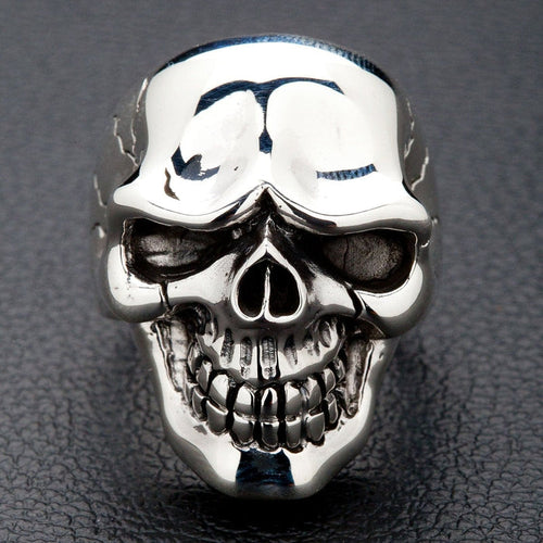 A front view of the heavy sterling silver handsome skull ring, showing its polished finish and stylized design.
