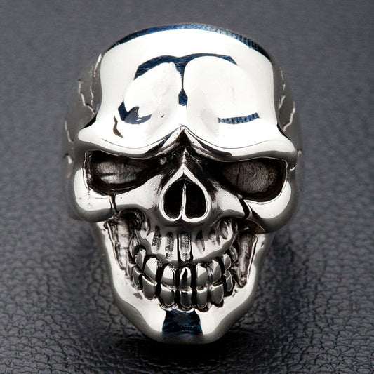 A front view of the heavy sterling silver handsome skull ring, showing its polished finish and stylized design.