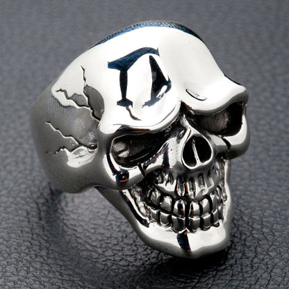 A side profile of the massive polished silver skull ring, highlighting its clean, powerful lines.