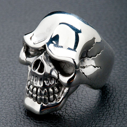 An angled view of the men's gothic biker statement skull ring in solid silver.