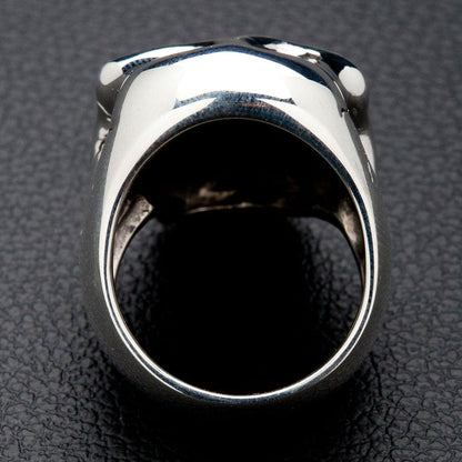 The inside of the heavy handsome skull ring, showing its solid silver construction.