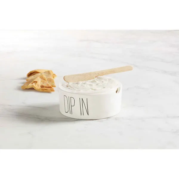 White ceramic server dip bowl with DIP IN text and wooden serving spoon in dip bowl set