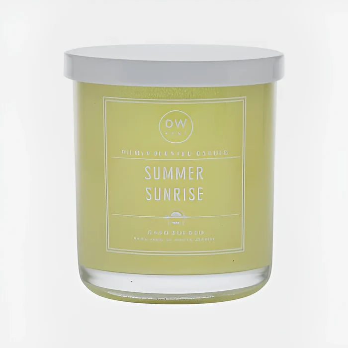 Scented candle in a glass jar with pale yellow label for Summer Sunrise Candle boho decor