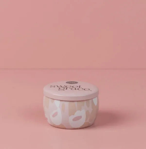 Pink candle tin with floral pattern from SWEET GRACE featuring soy-blend wax