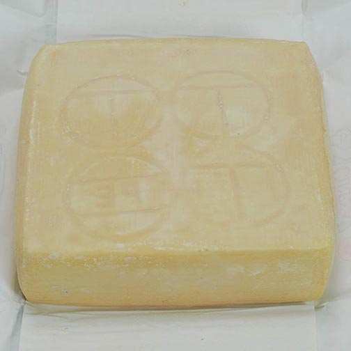 TALEGGIO / Ciresa cheese block showcasing washed rind.
