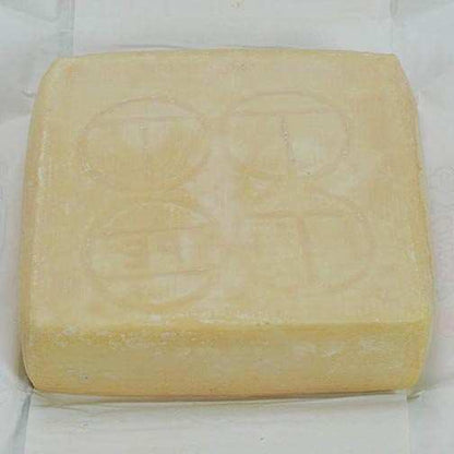 TALEGGIO / Ciresa cheese block showcasing washed rind.