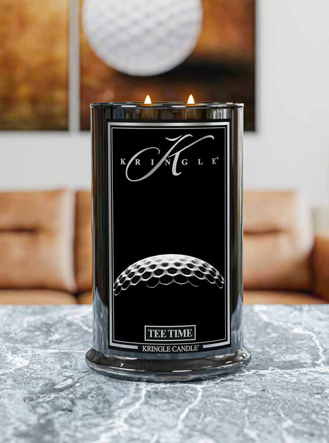 Kringle Candle with golf ball design on a table