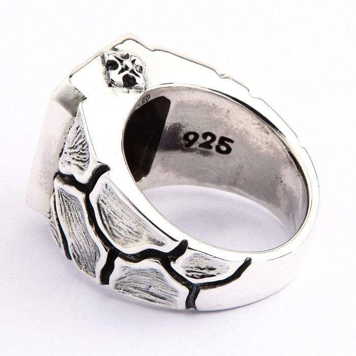 Men's Tiger's Eye gemstone ring showing 925 sterling silver hallmark and detailed band texture