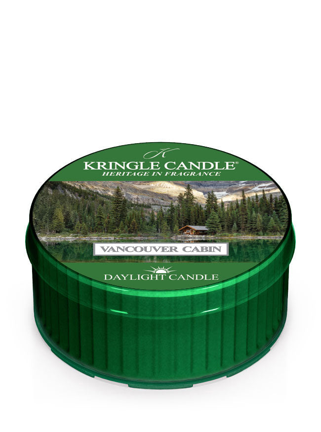 DayLight candle featuring a scenic label of a lakeside cabin surrounded by trees and mountains,  "Vancouver Cabin"