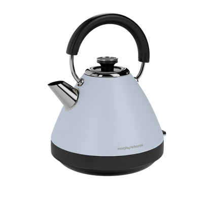 A duck egg blue pyramid-shaped electric kettle with a black handle and base, featuring a stainless steel spout and a removable limescale filter.