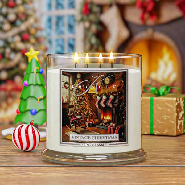 Kringle Candle with Christmas design on a table with festive background