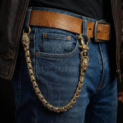 Model wearing a solid brass Viper Snake wallet chain attached to jeans belt loop, showcasing intricate snake scale details and heavy biker jewelry style