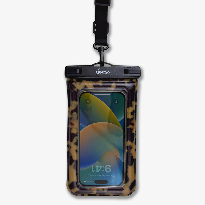 Close-up front of Waterproof Phone Pouch showing Brown Tort print, clear touch window, Sonix logo clasp and detachable black strap on white background
