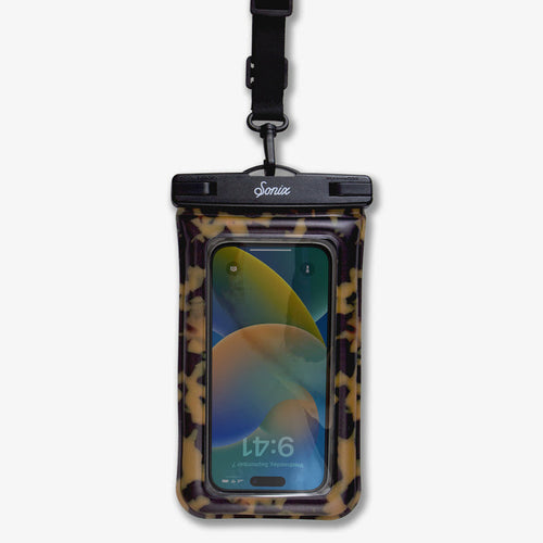 Close-up front of Waterproof Phone Pouch showing Brown Tort print, clear touch window, Sonix logo clasp and detachable black strap on white background