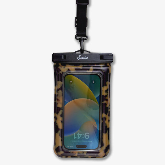 Close-up front of Waterproof Phone Pouch showing Brown Tort print, clear touch window, Sonix logo clasp and detachable black strap on white background