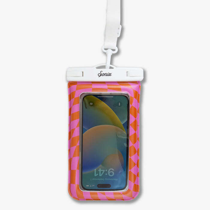 Close-up front of waterproof phone pouch (Checkmate Pink/Orange) showing white Sonix clip and lanyard, clear phone window