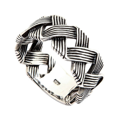 925 sterling silver woven band ring angled view displaying oxidized detailing in wave pattern