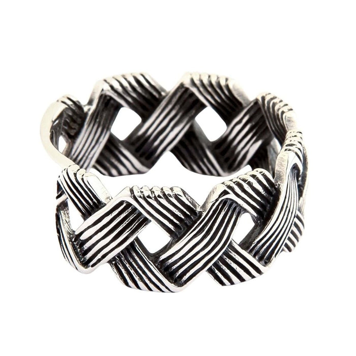 Mens woven sterling silver ring showing openwork wave pattern and polished finish