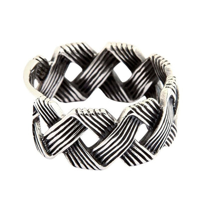 Mens woven sterling silver ring showing openwork wave pattern and polished finish