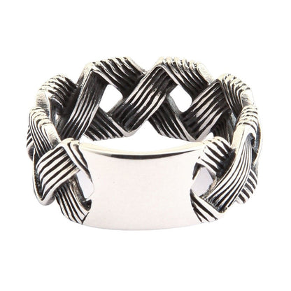 Oxidized sterling silver wave knot ring showing dark accents and contrast detailing