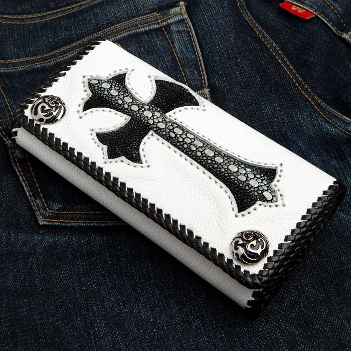 An angled view of the exotic leather wallet, highlighting the silver-plated flame concho snaps.