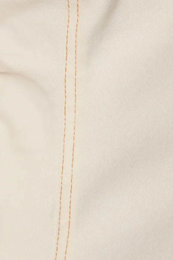 Wide shoulder button utility midi dress with cream fabric and tan vertical stitching